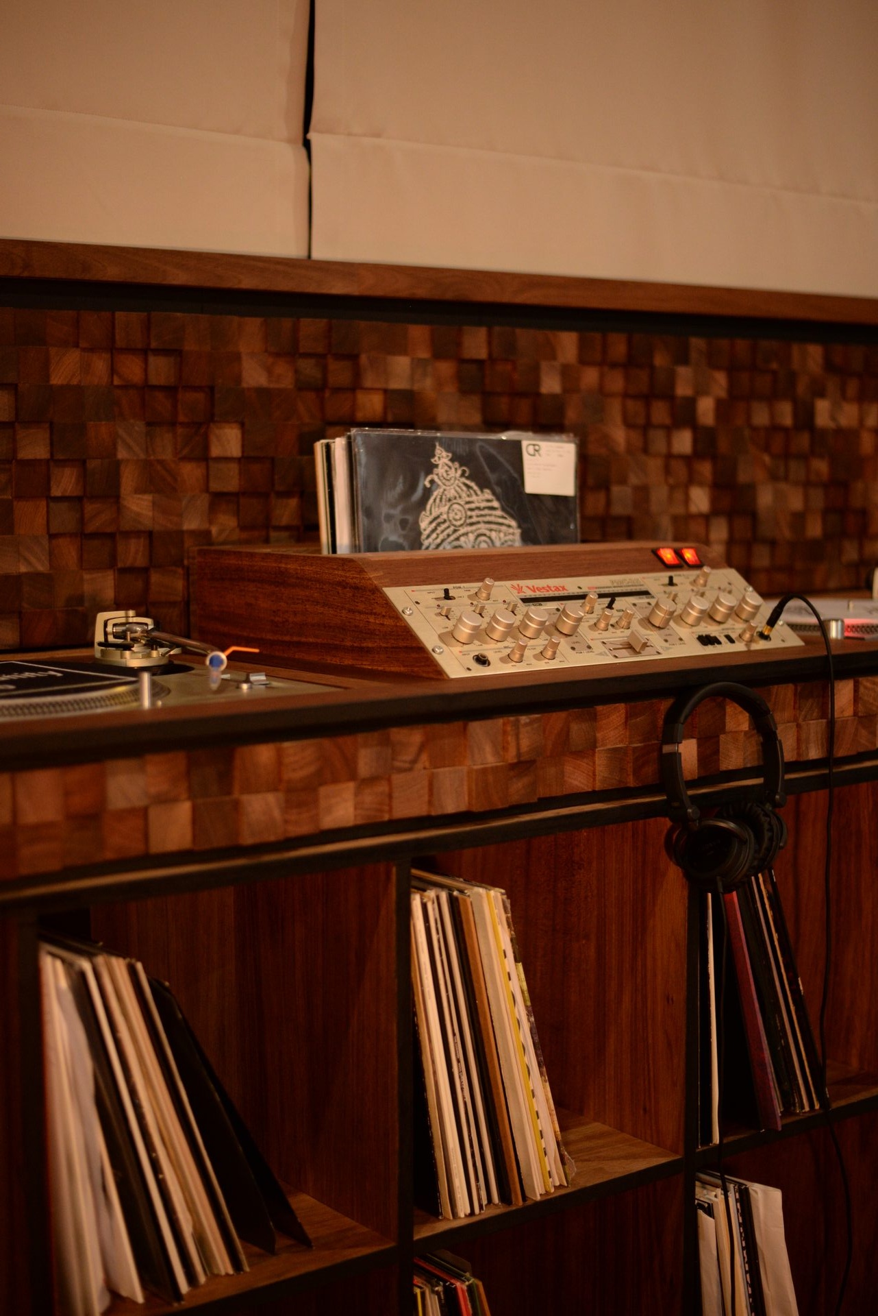 Bespoke custom DJ booth with Vestax mixer and vinyl record storage Bangkok Thailand